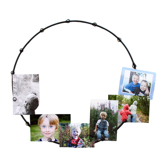 Black steel circle photo holder with photos
