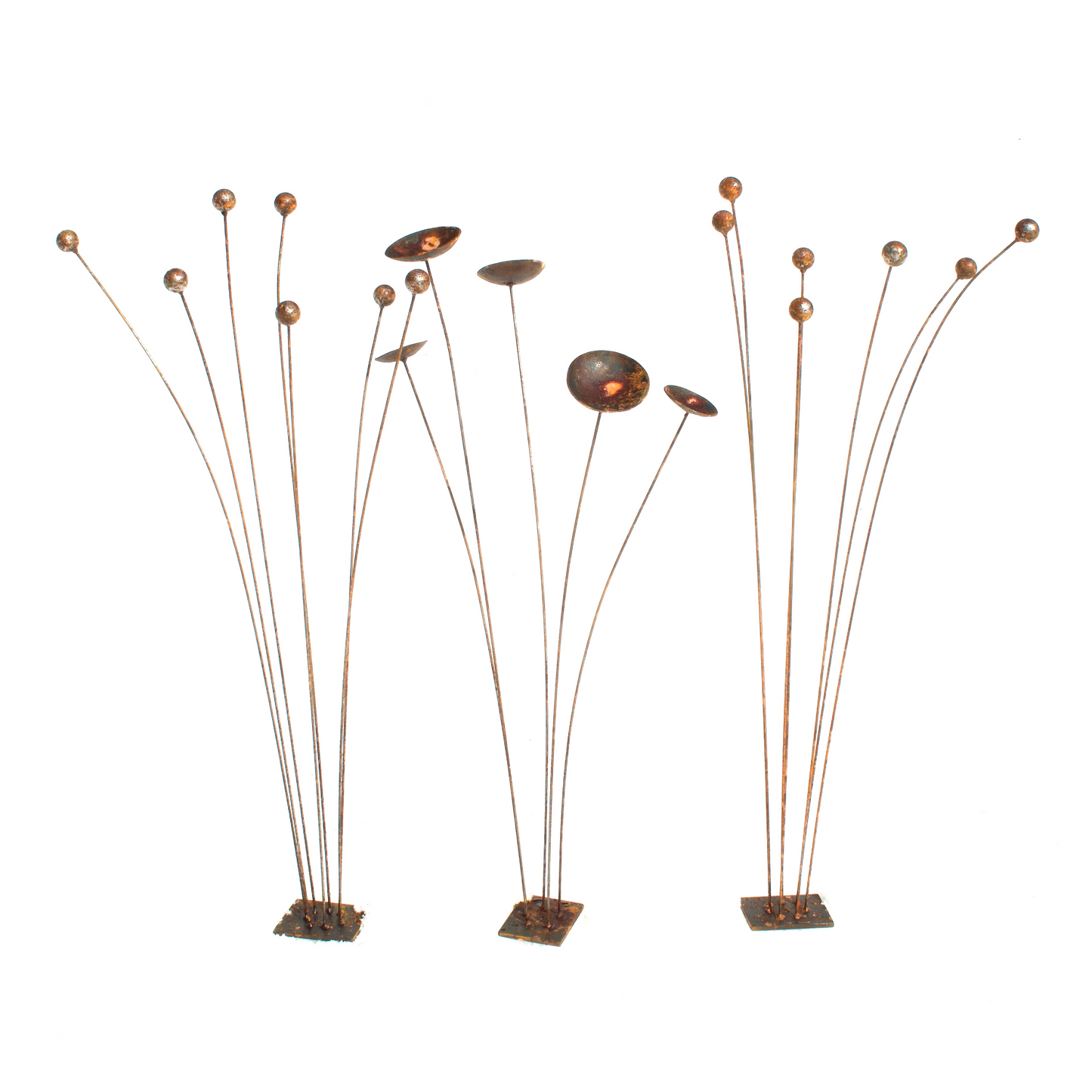 Group of kinetic metal garden art. Stems with buds and bowl shaped flowers